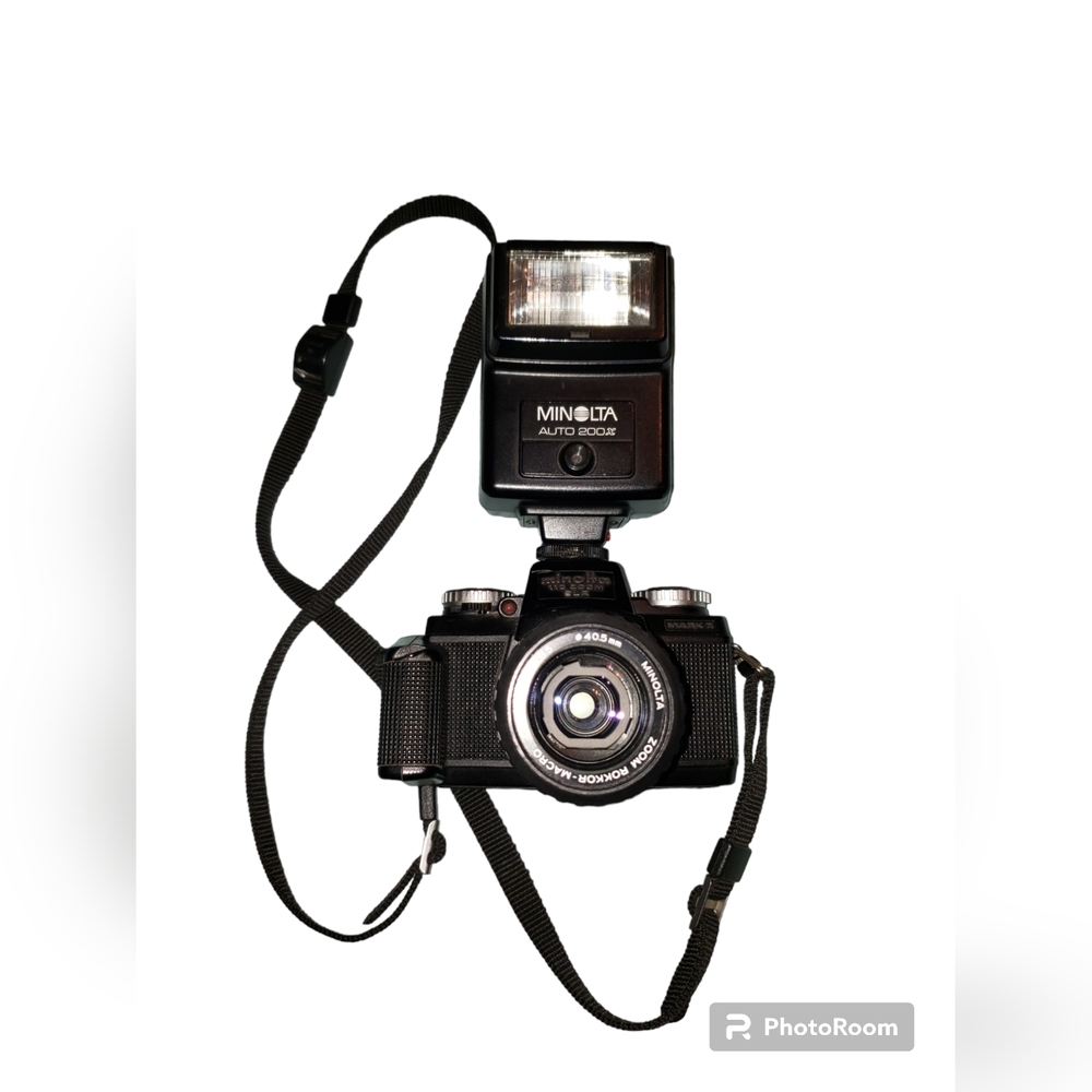 Minolta Camera 110 SLR Zoom With Flash & Strap